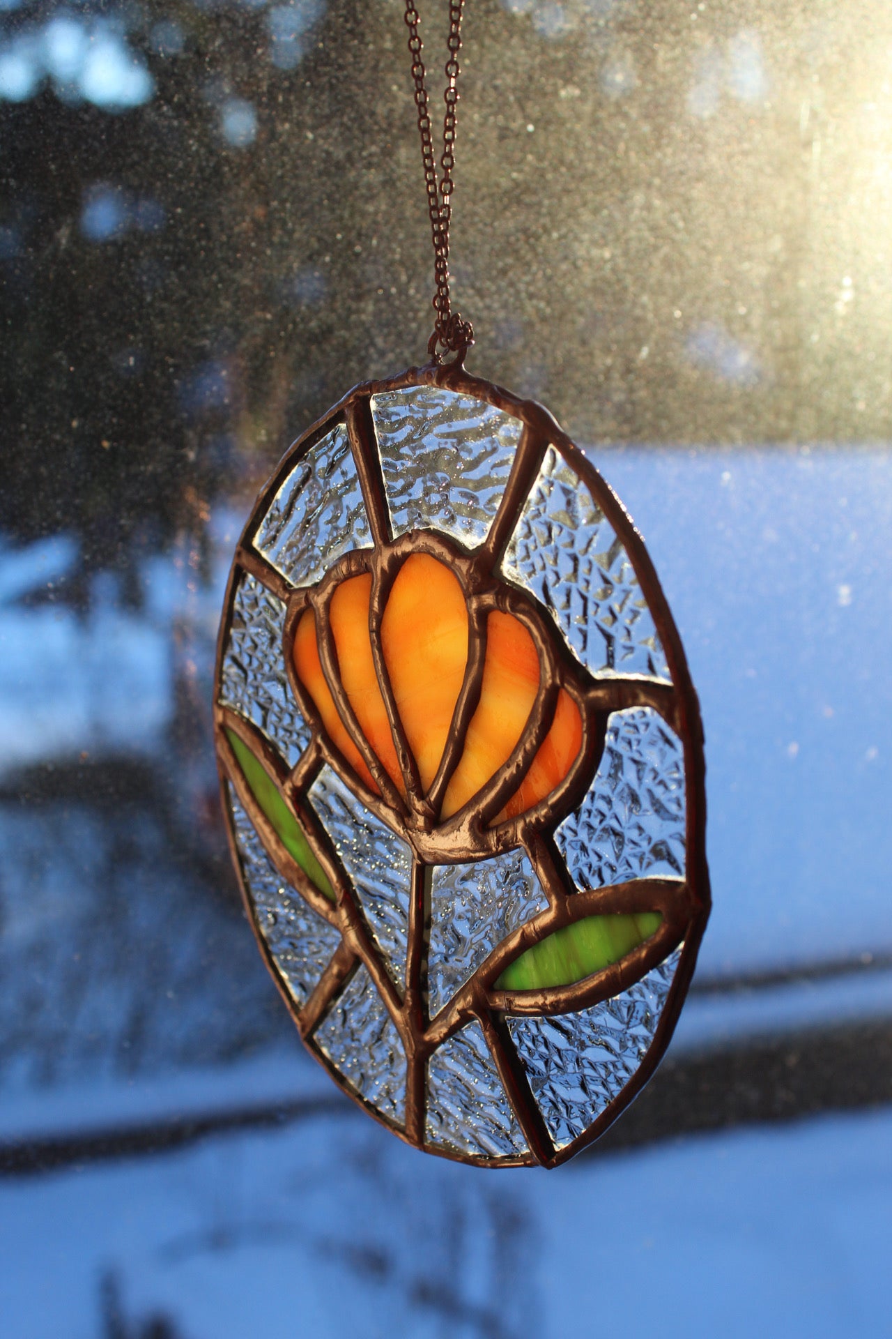 Orange flower sun catcher