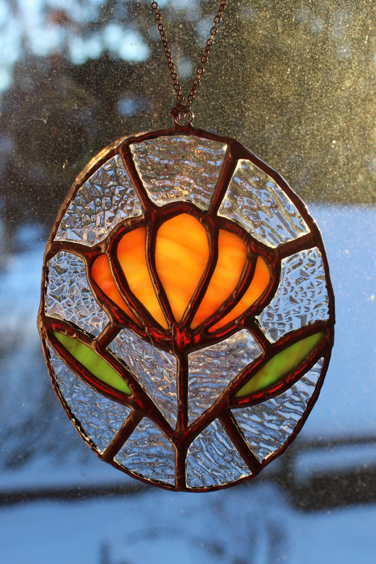 Orange flower sun catcher